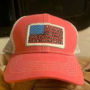 Trucker hat with the flag on it. Perfect for the Fourth of July or anytime.